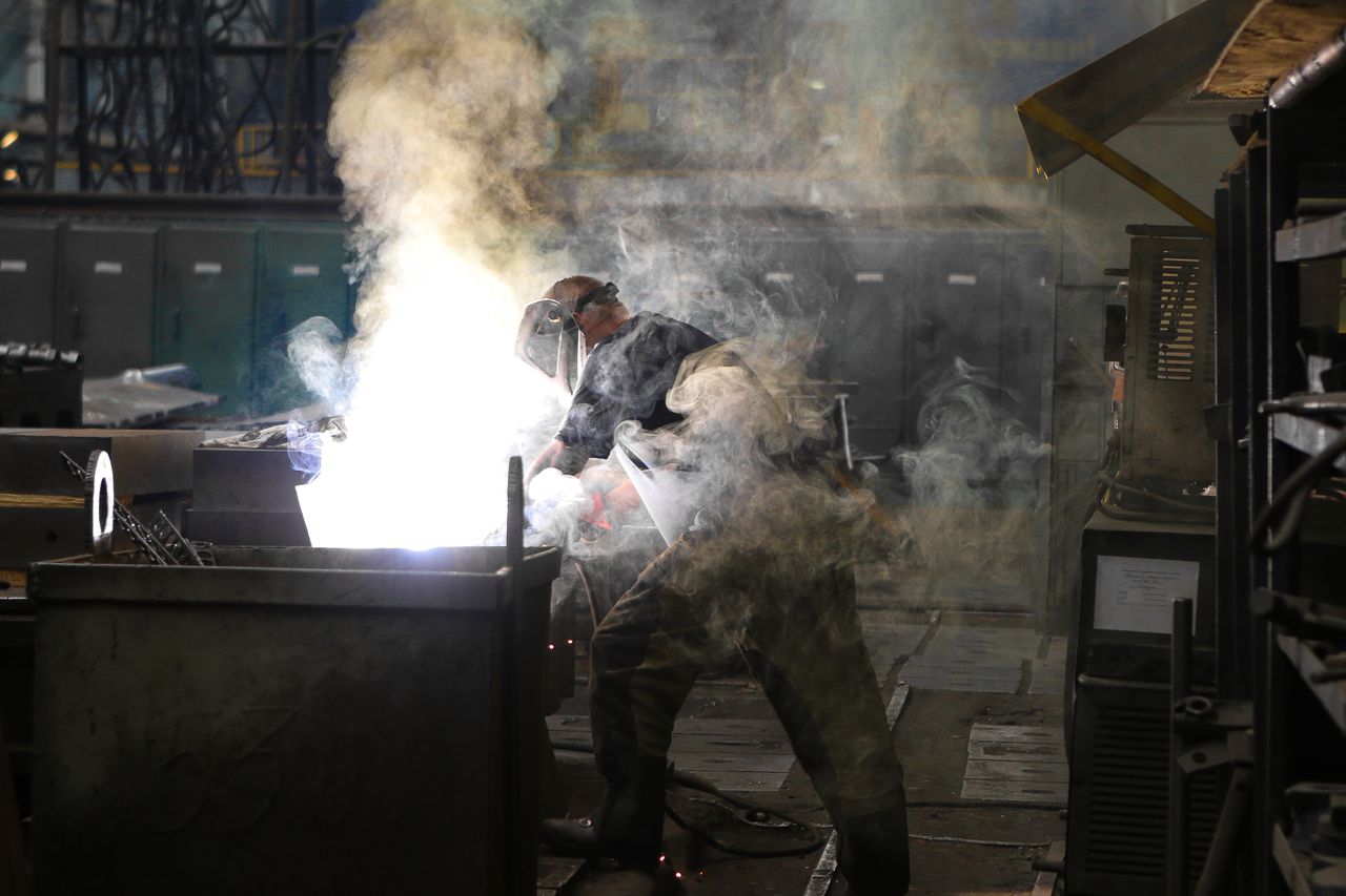 Torch cutting work with flame and smoke