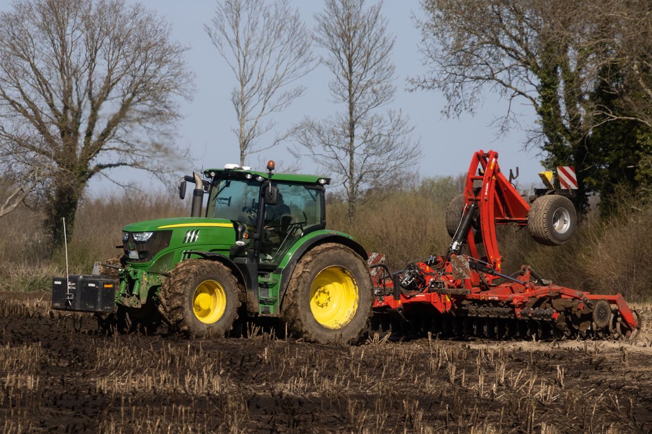 Tractor working a field